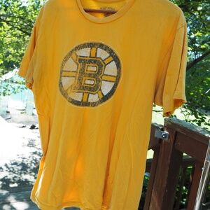 Vintage yellow Boston Bruins tee in medium, 100% cotton
